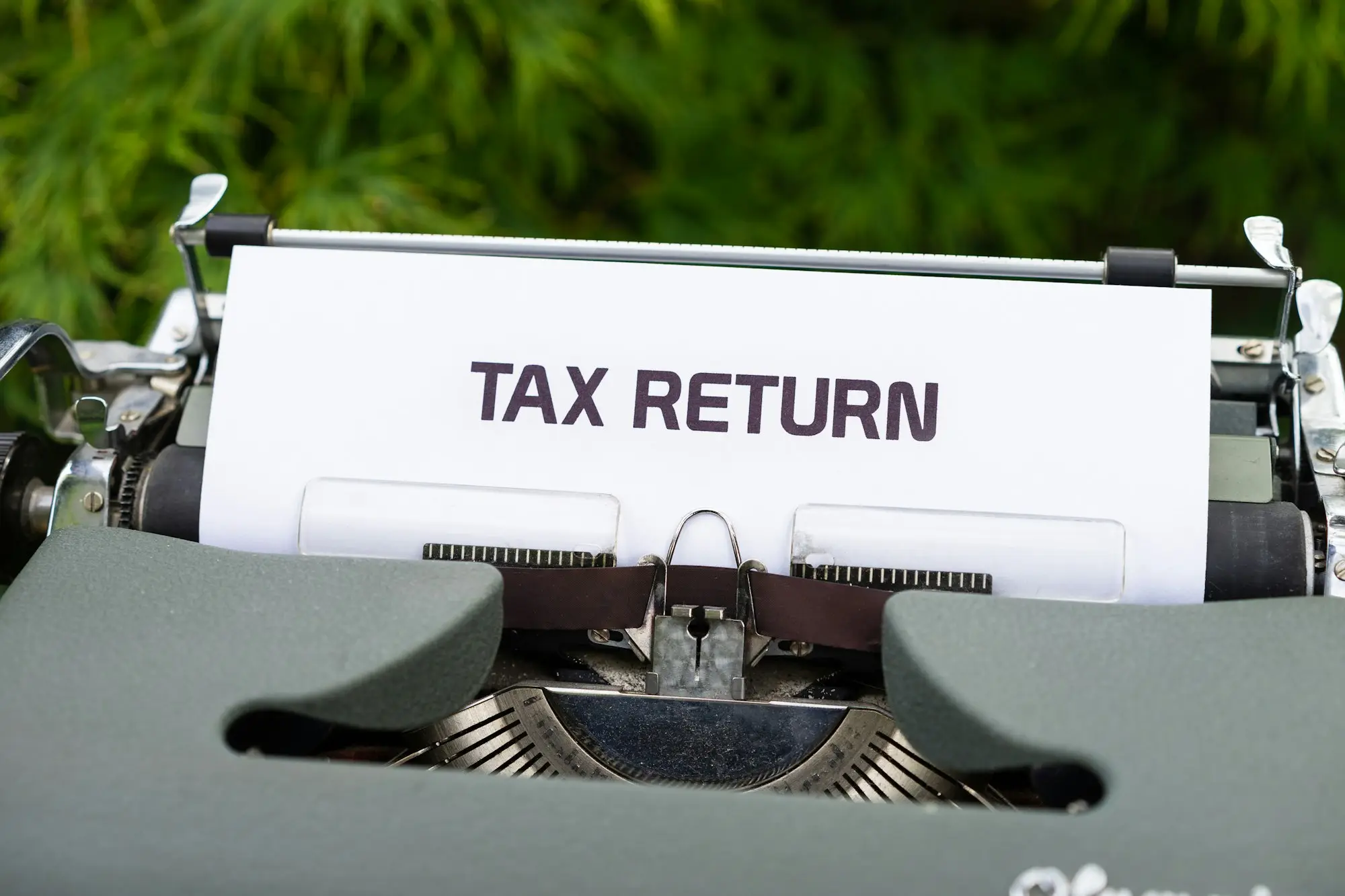 Tax return page in a typewriter